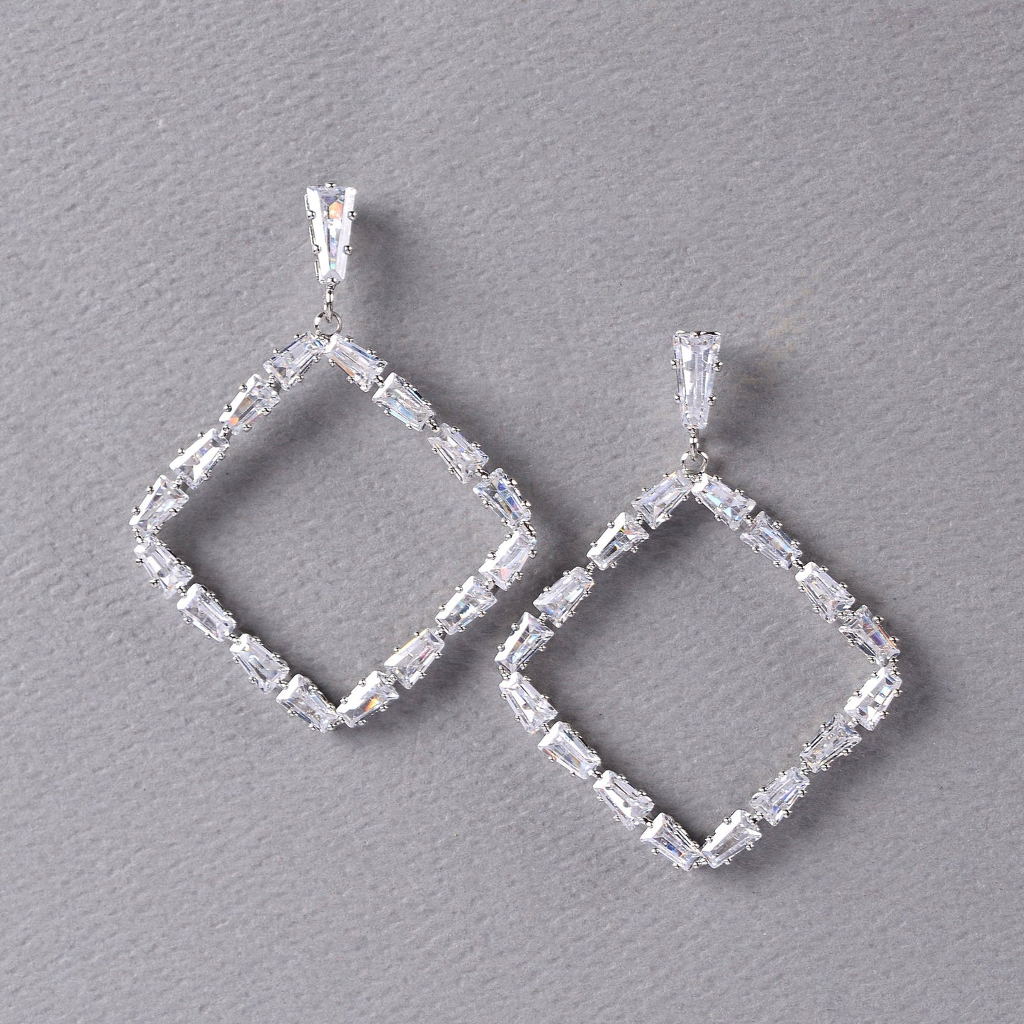 Glowria Star- Stone Studded Zirconia Dangler Earrings