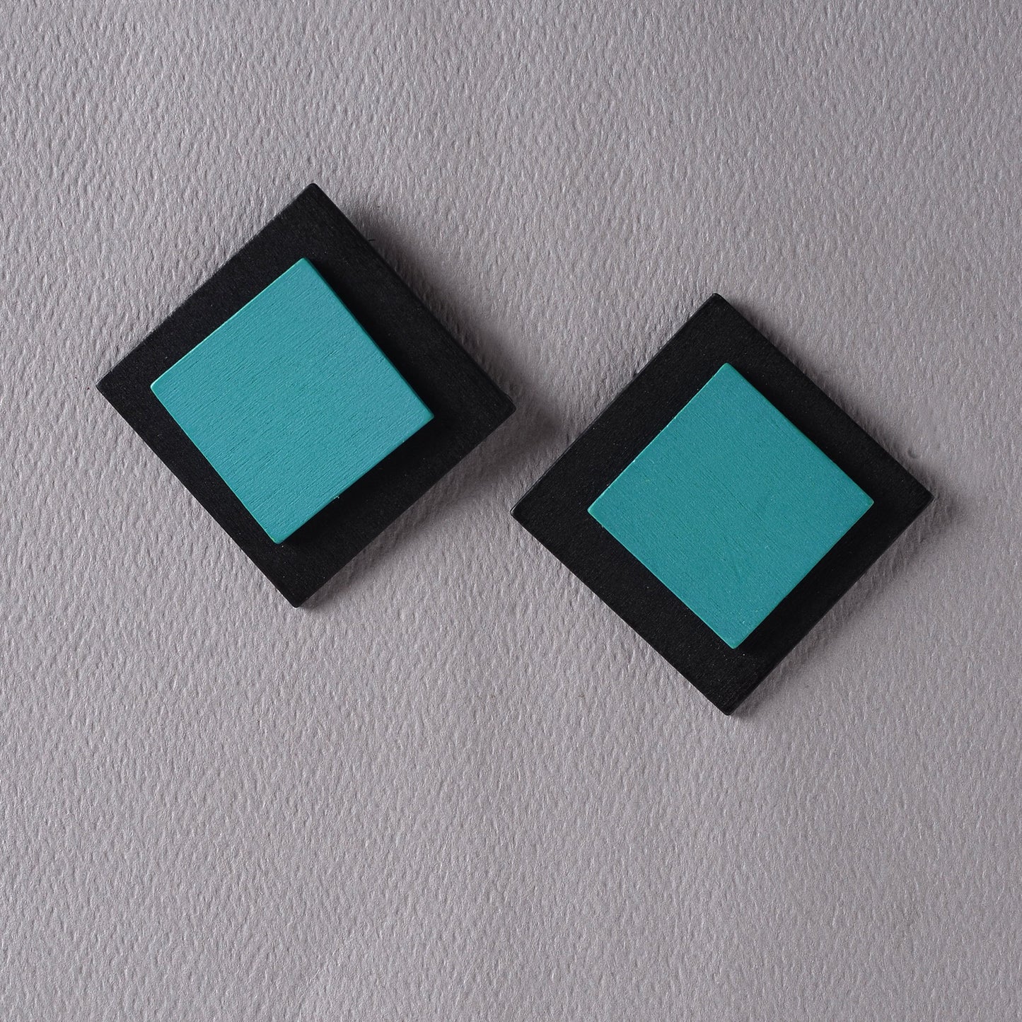 Frame Edit- Dual colored stud earrings