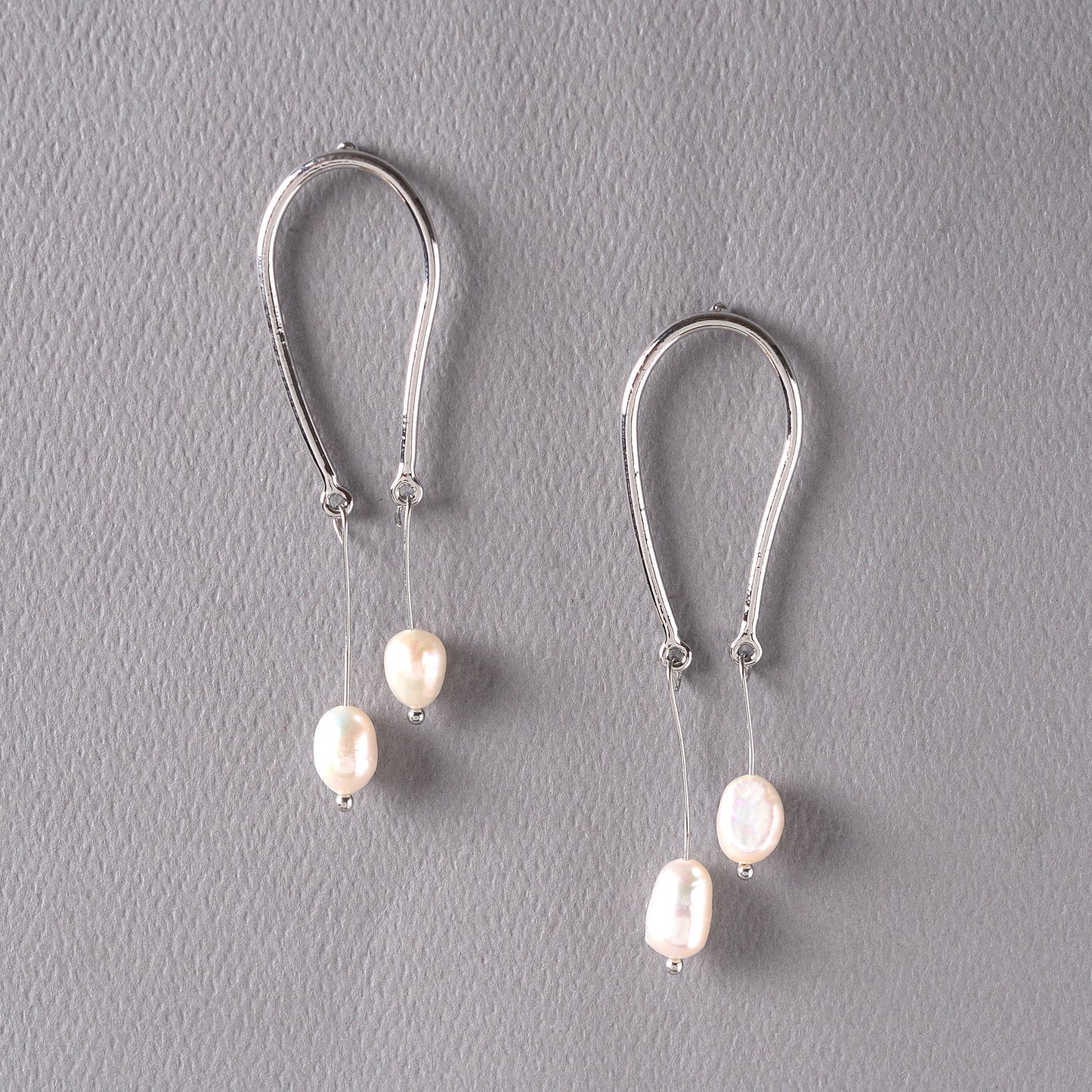 Ceafted curve- Hanging pearl dangler earrings
