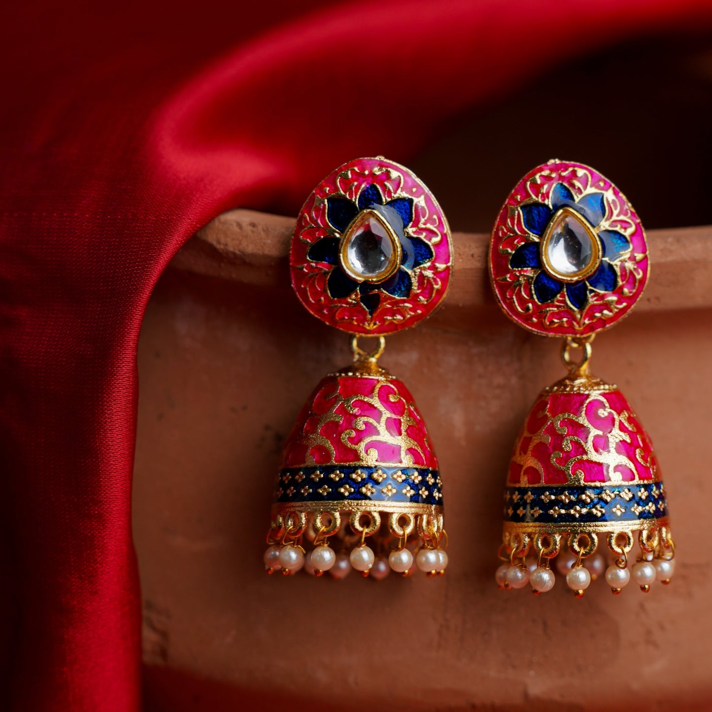 Advika- Stone Studded Hanging Pearls Jhumka Earrings(Red)