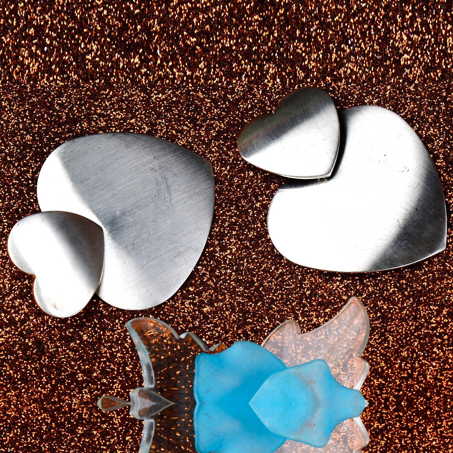 Silver Heart= Merallic heart shaped dangler earrings