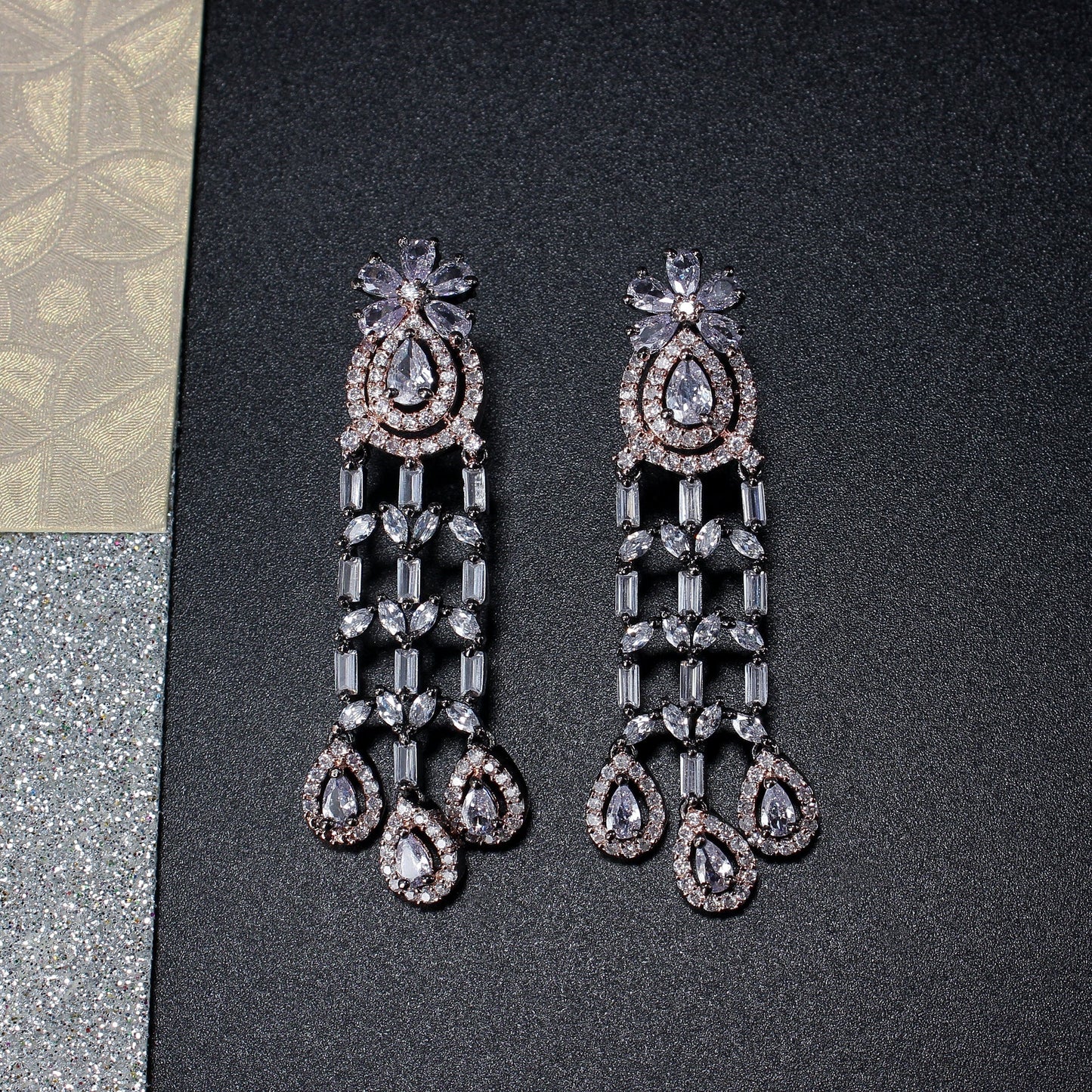 Diamond like hanging Earring in Rose Gold finish