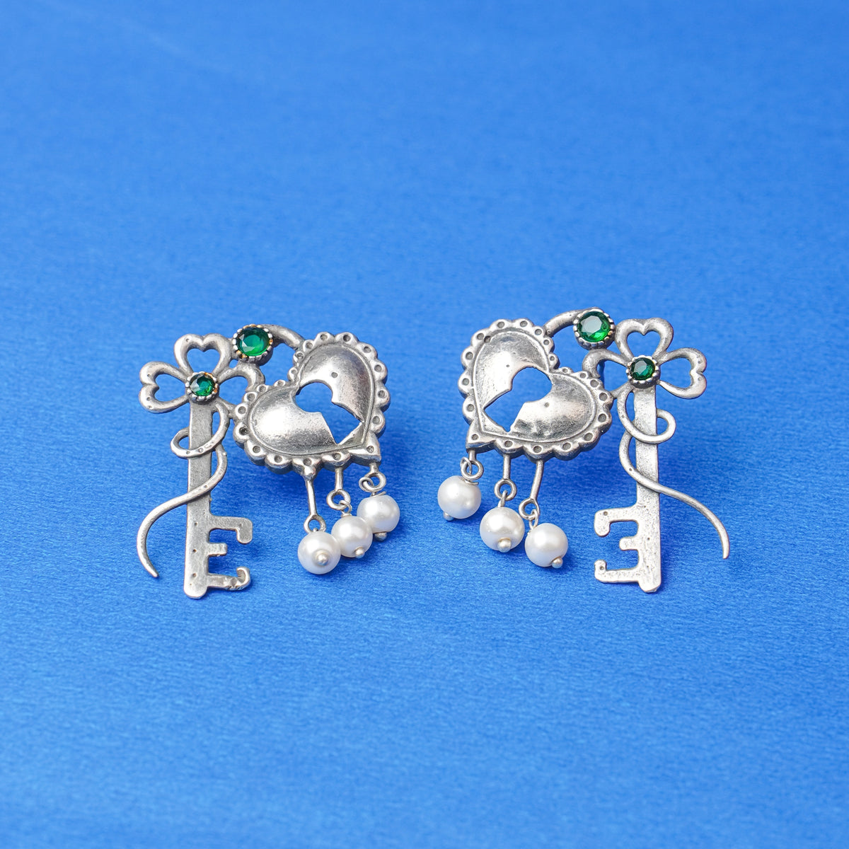 Kunjika- Silver Brass Oxidised dangler earrings (Green)