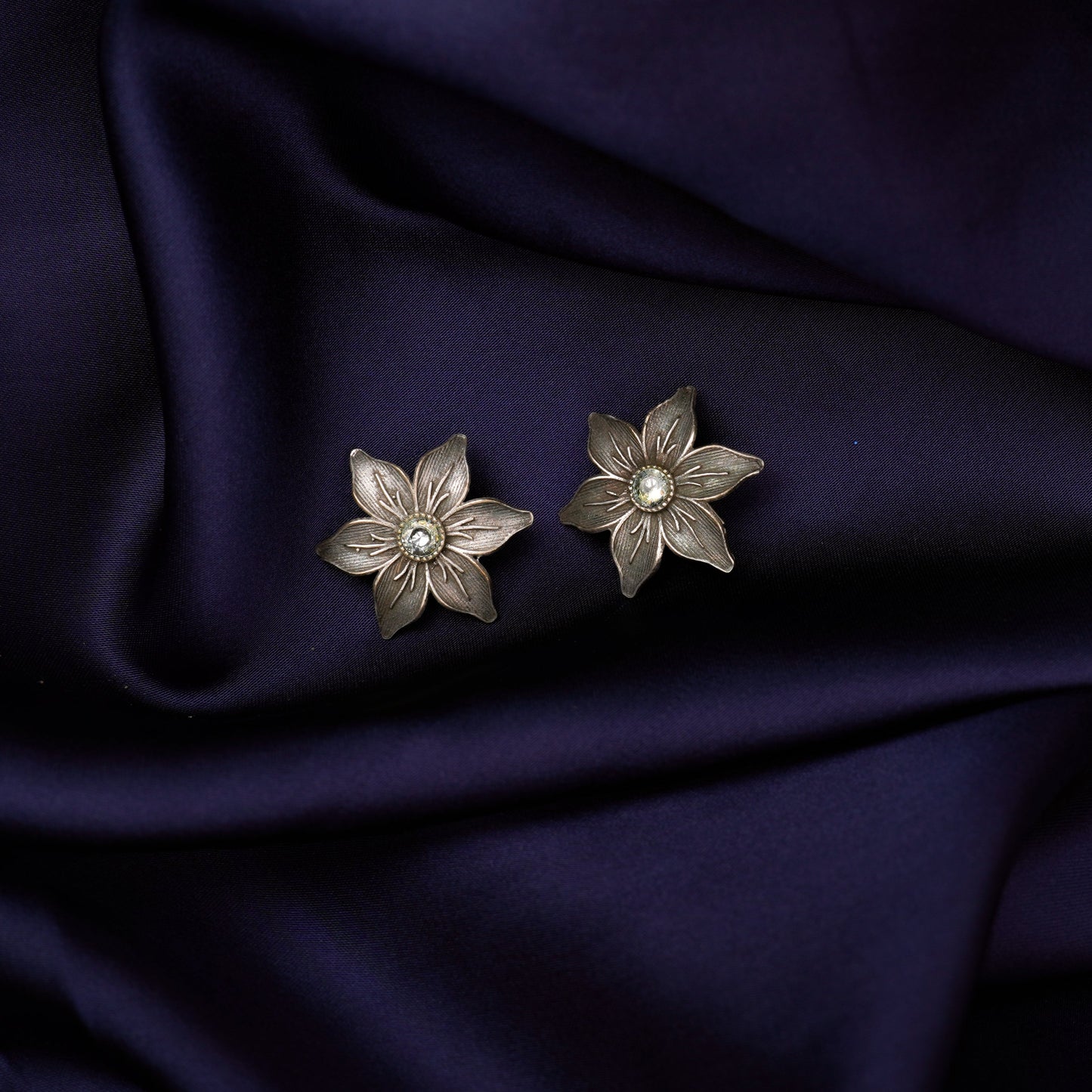 Juhi- Silver Brass Stone-Studded Stud Earrings(White)
