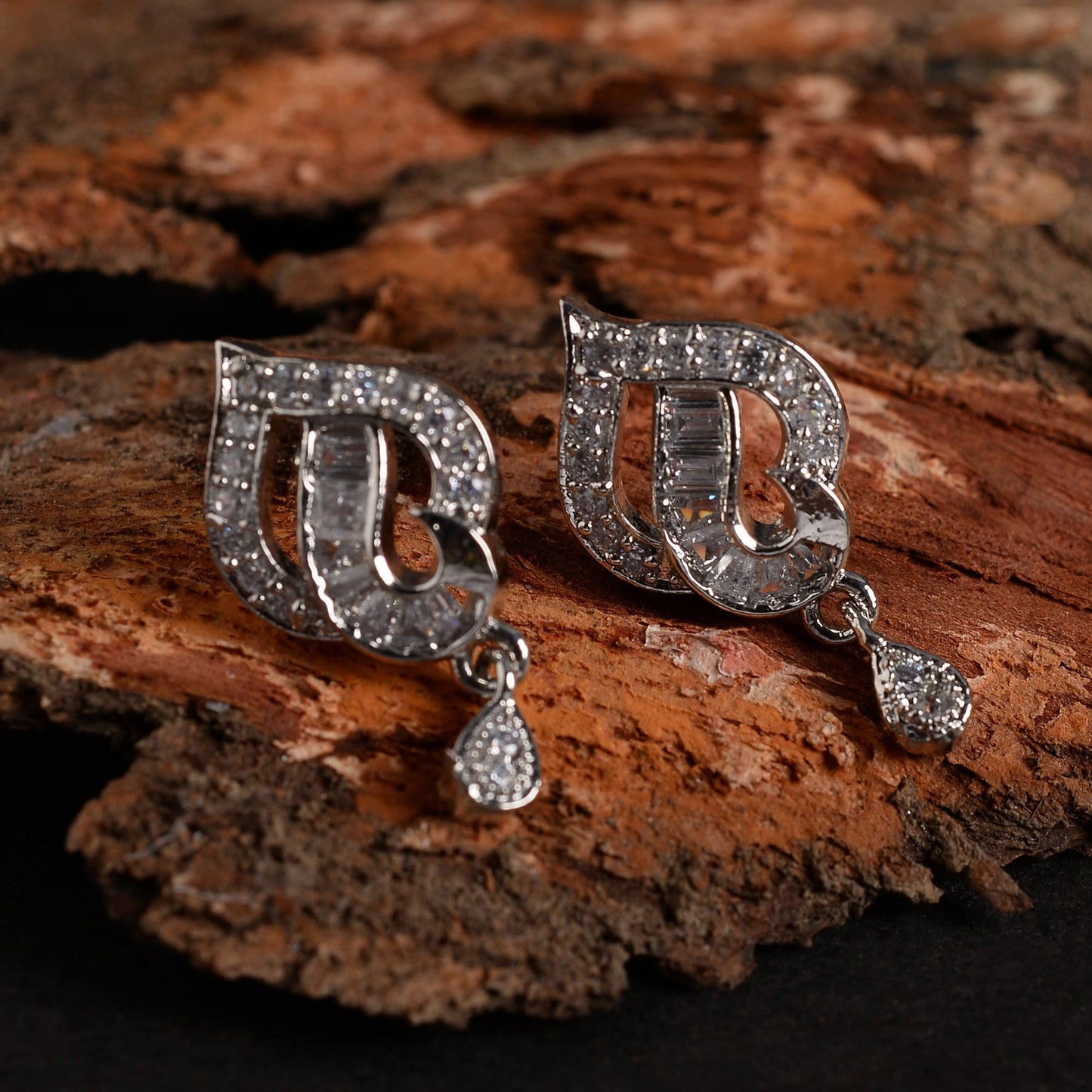 Noctavia- Stone Studded Zirconia Dangler Earrings