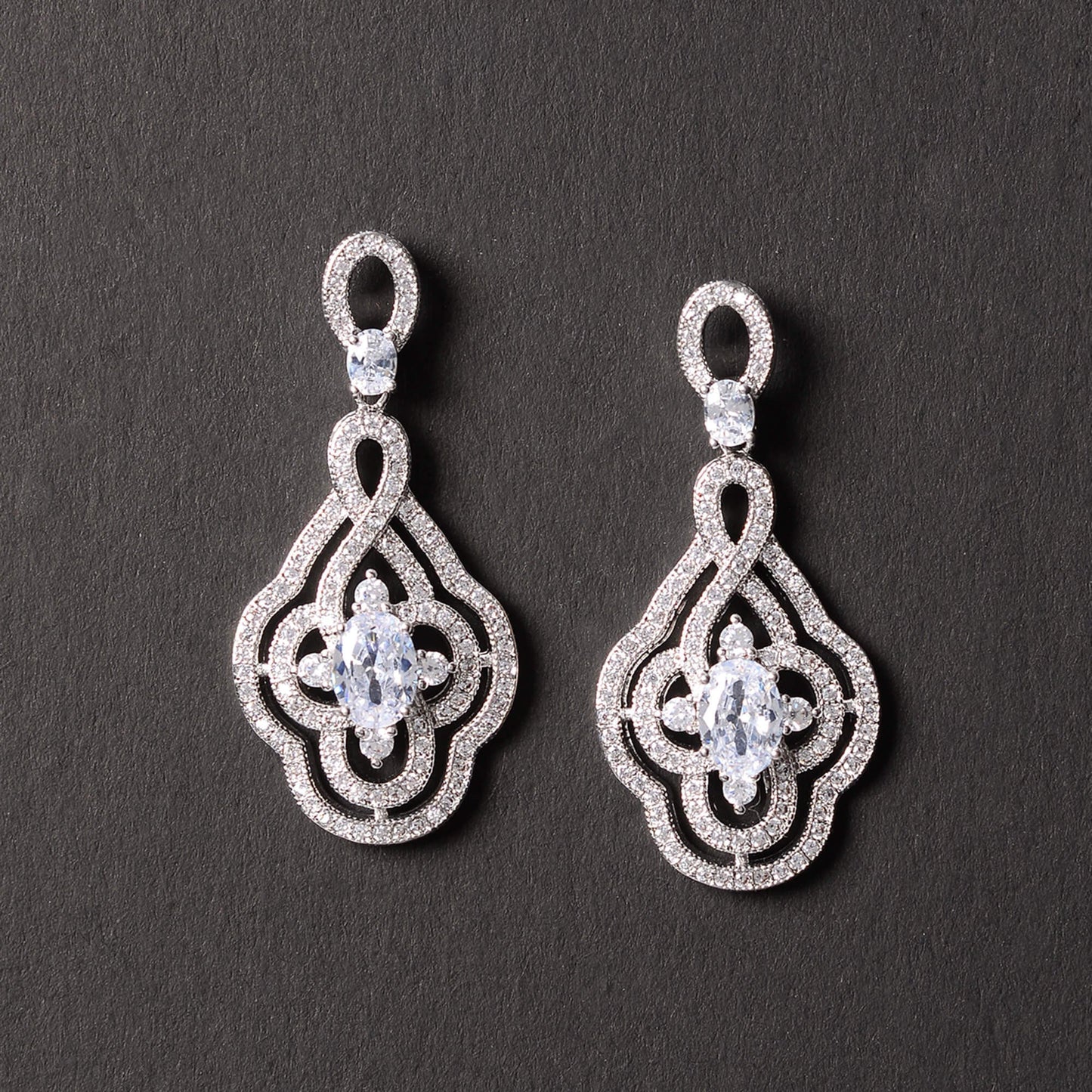 Luminya- Stone Studded Zirconia Dangler Earrings