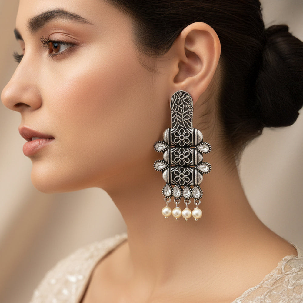 ManiStambh – Silver Brass Oxidised Dangler Earrings (White)