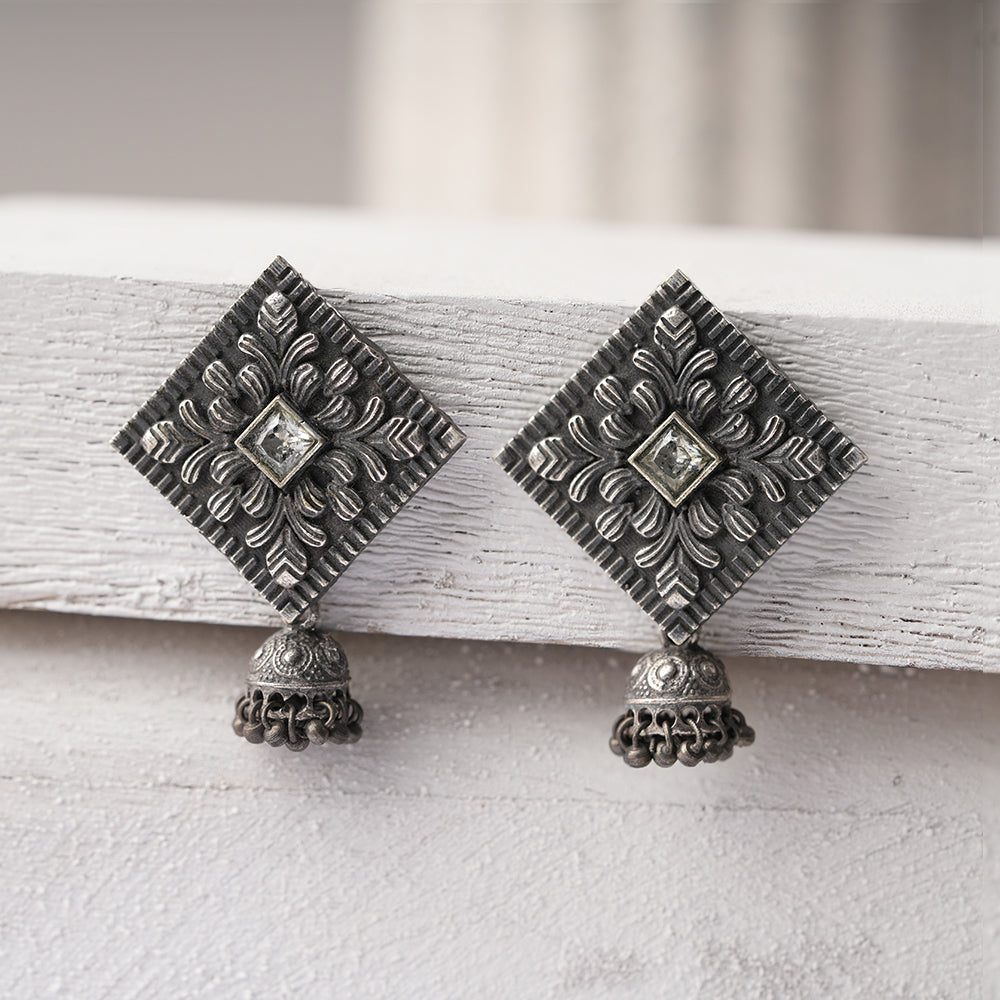 Manika- Silver Brass Pearl jhumka earrings