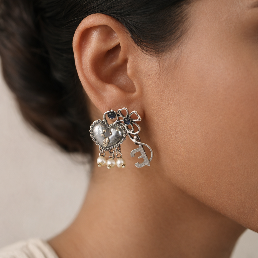 Kunjika- Silver Brass Oxidised Stud Earrings(Black)