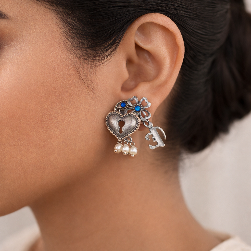 Kunjika- Silver Brass Oxidised dangler earrings (Blue)