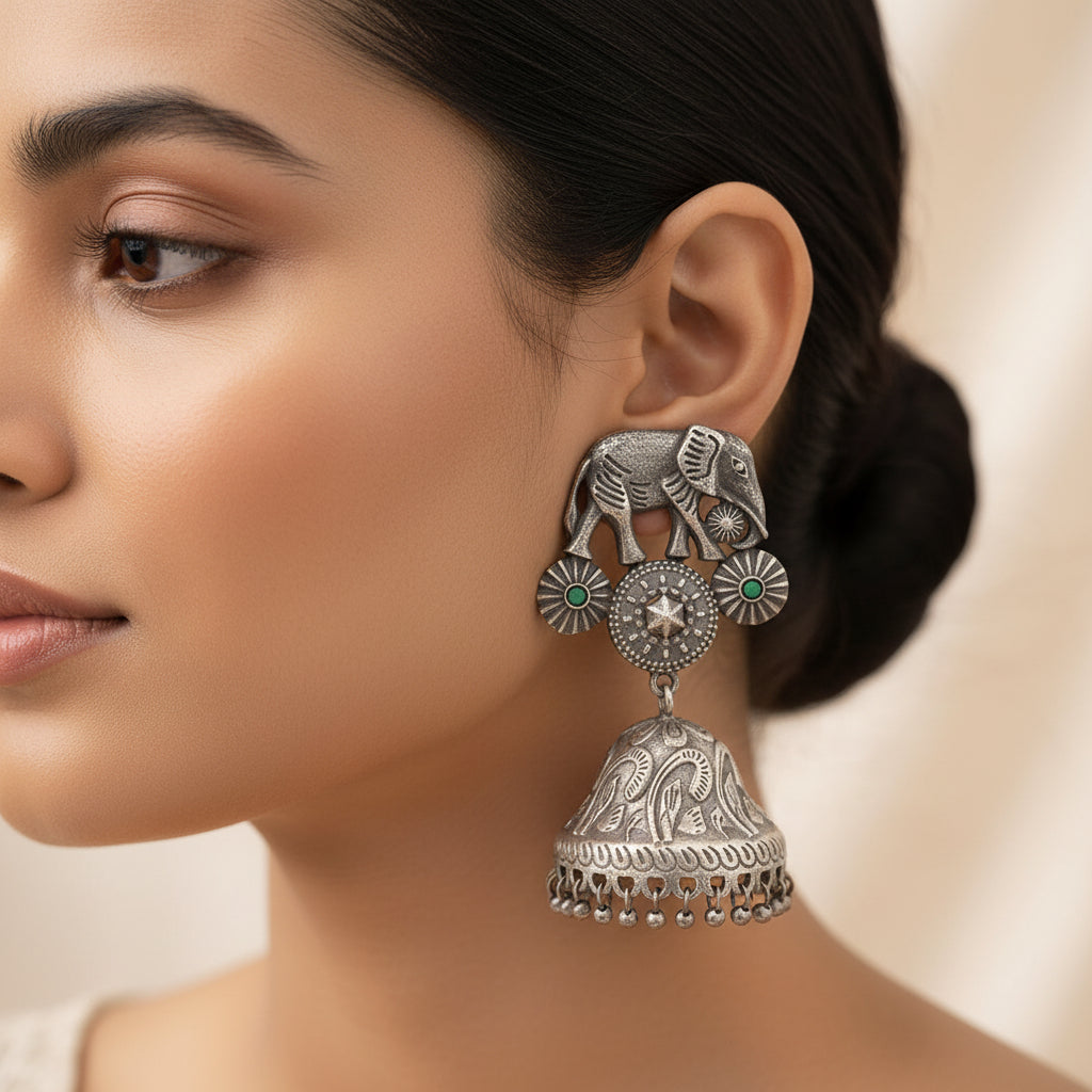 Hastini- Silver Brass Oxidised Jhumka earrings