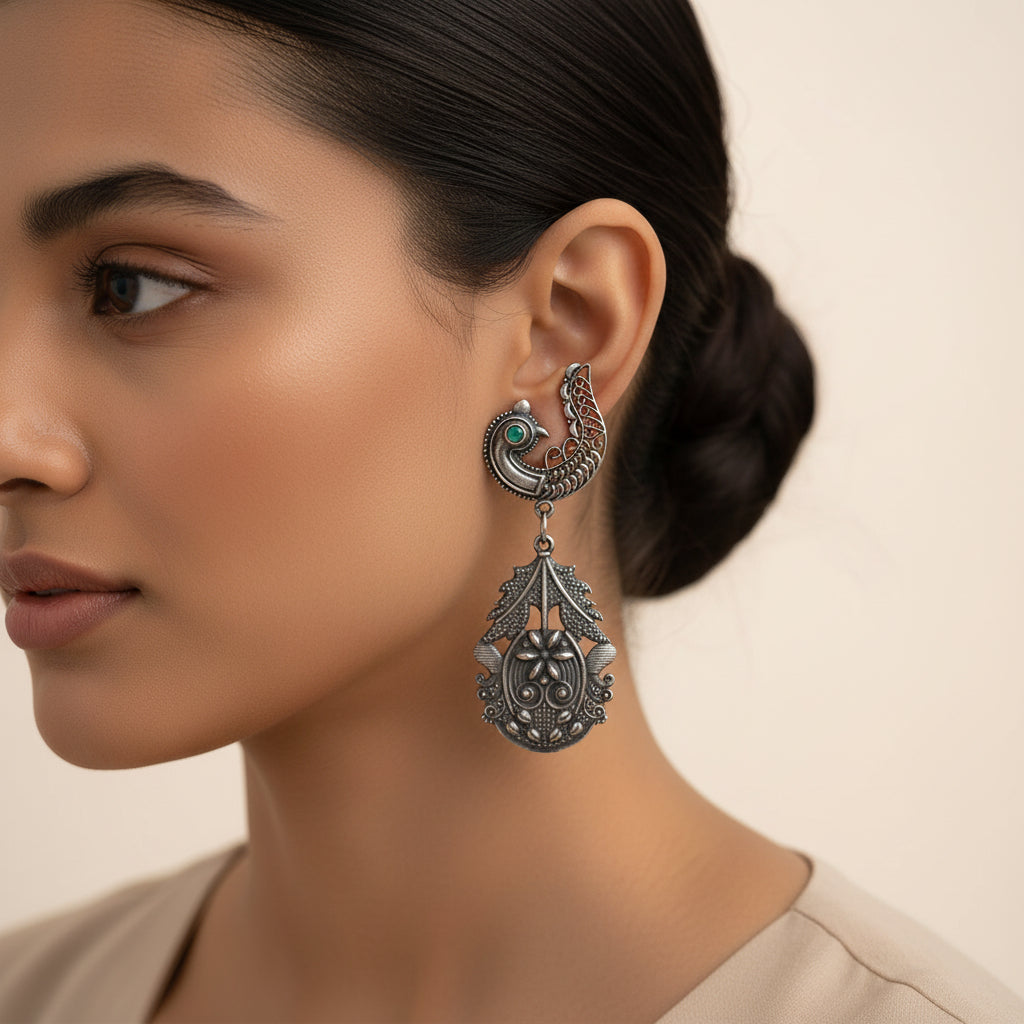 Suvarna- Silver Brass Oxidised dangler earrings