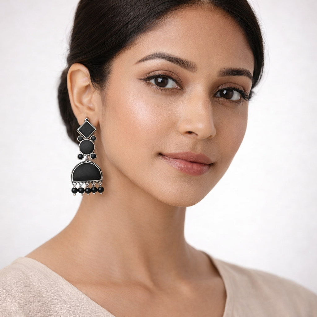 Aakar- Silver Brass dangler earrings