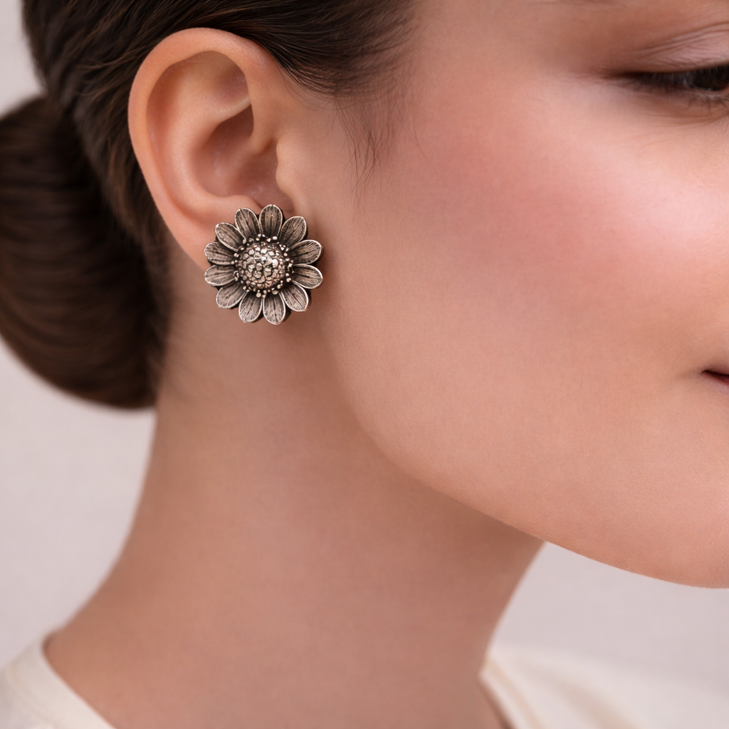 Suryamukhi- Silver Brass Oxidised stud earrings