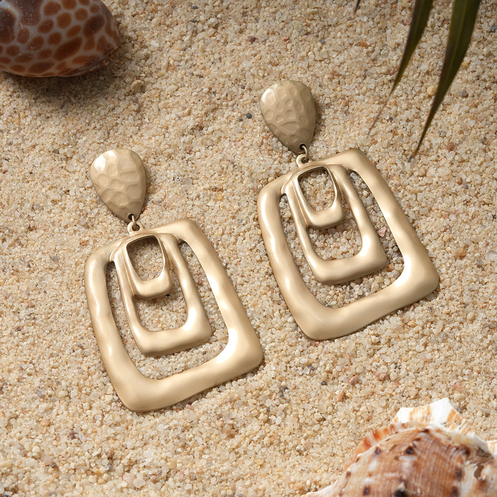 Misty Bloom- Geometrical matte golden dangler earrings