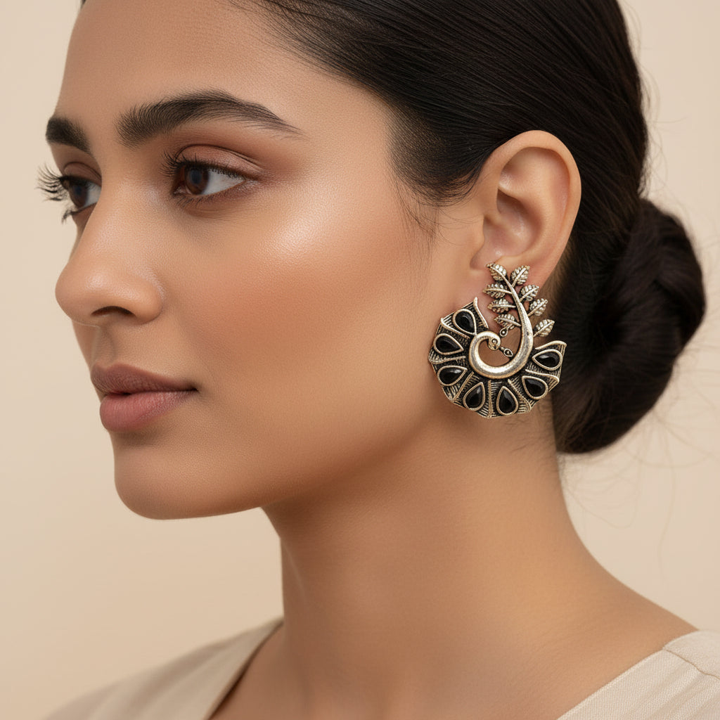 Peacock pearl- Stone syudded peaccock shaped studs earring
