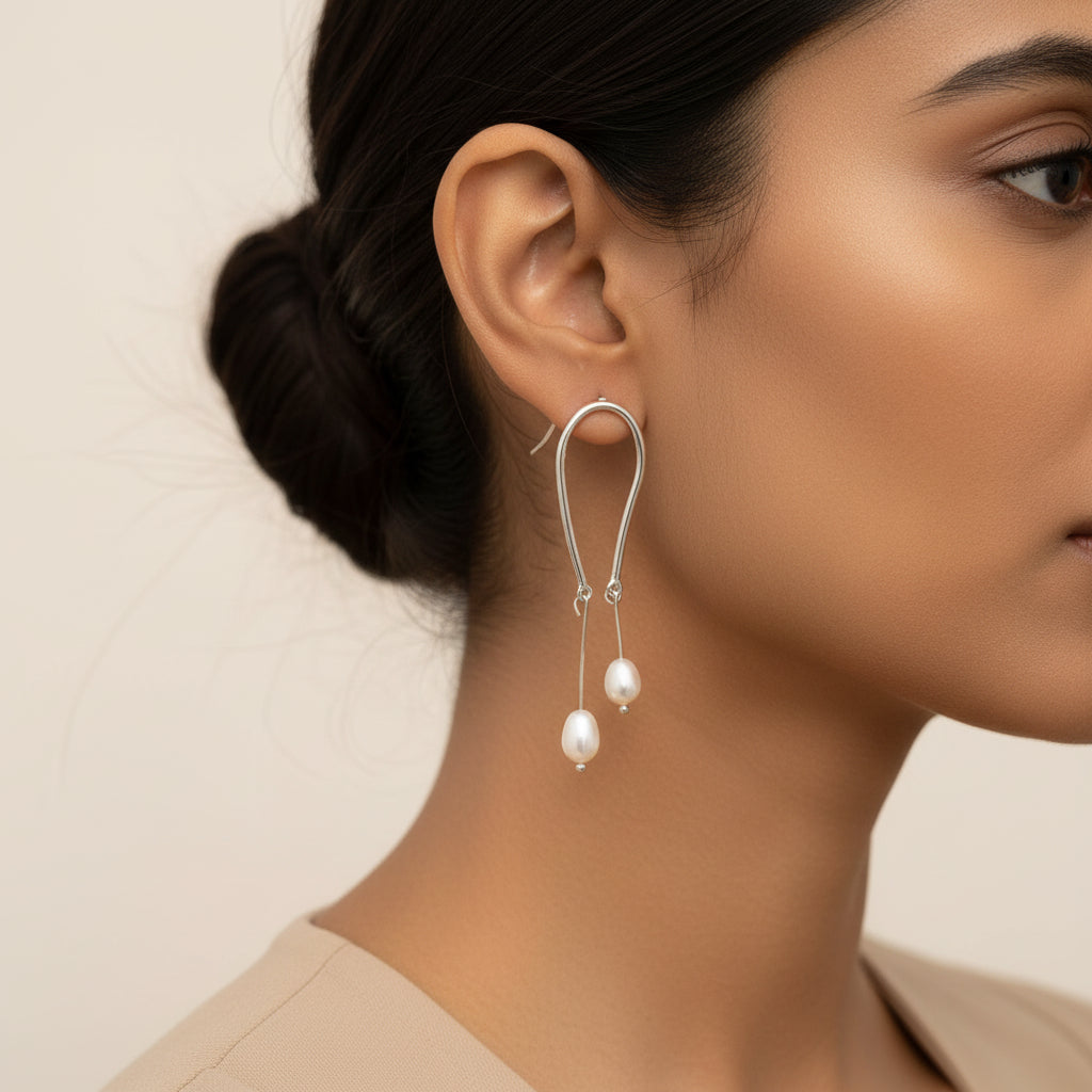 Ceafted curve- Hanging pearl dangler earrings