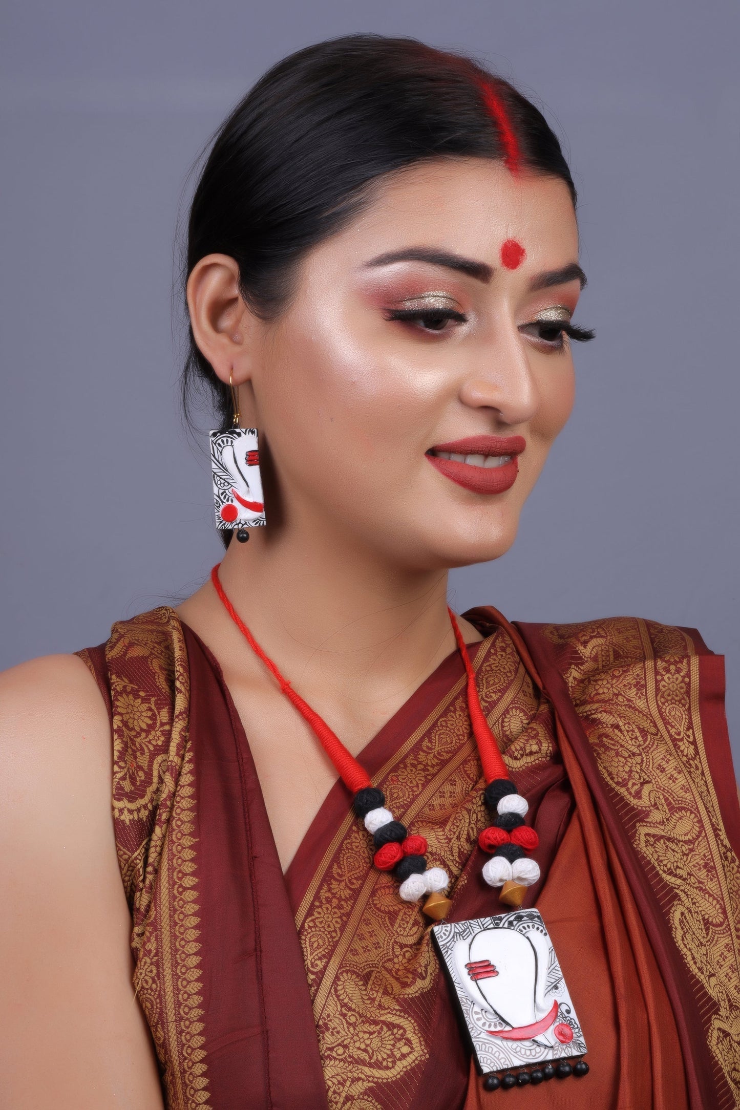 Mridrang-  Handcrafted clay Ganesha Necklace Set
