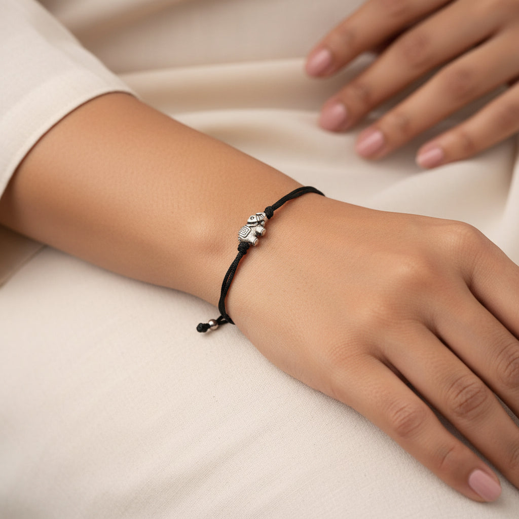 Airavat- Silver oxidised charm bracelet