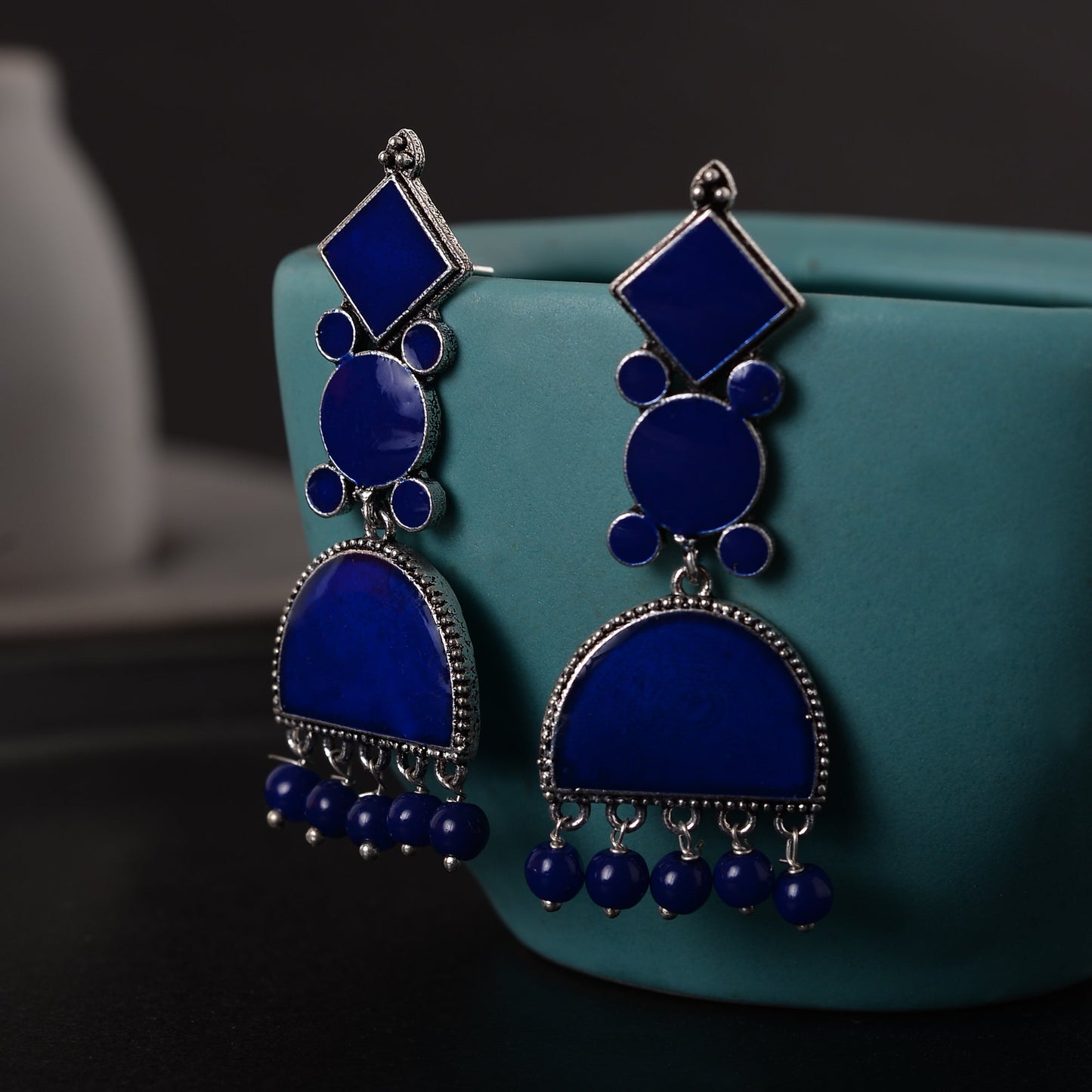 Aakar- Silver Brass dangler earrings