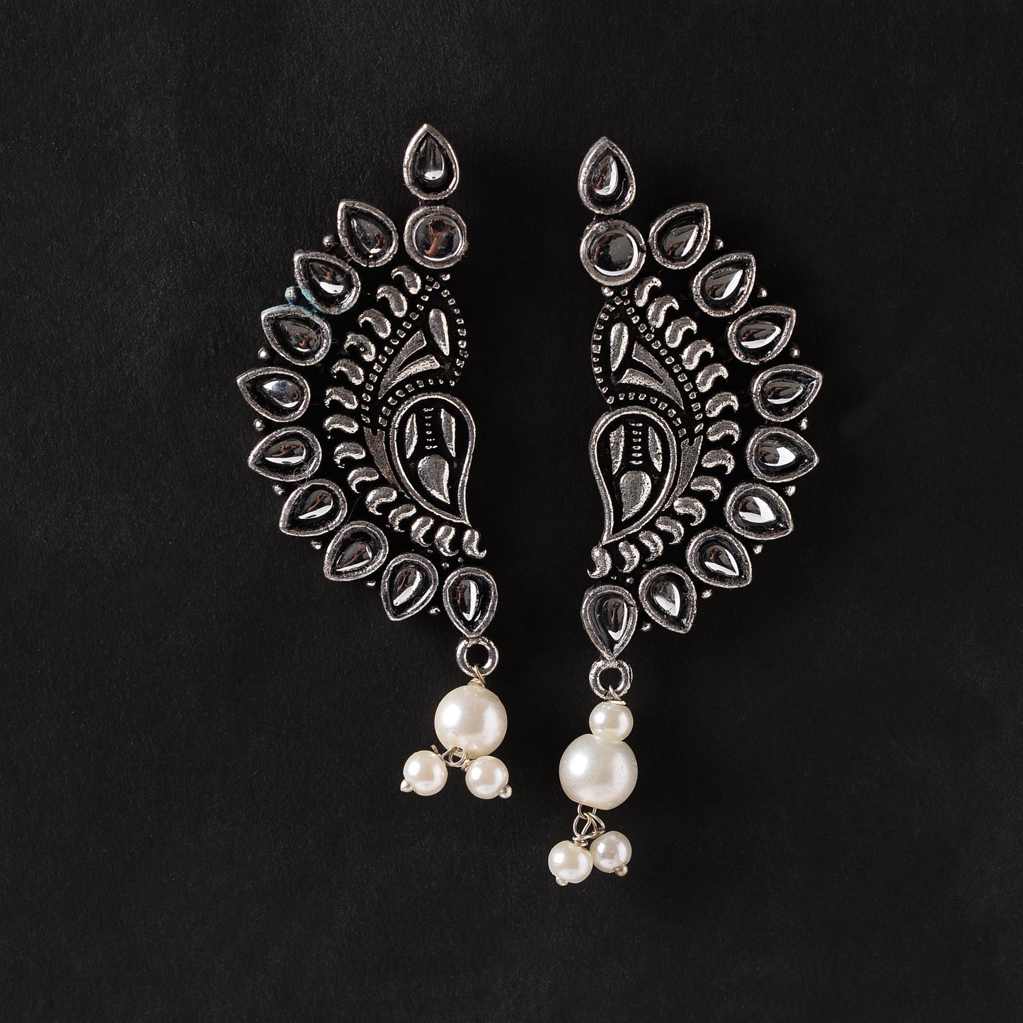Traditional twirls- Handing pearl oxidised stud earrings