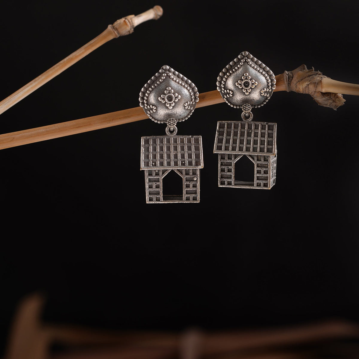 Niwas- Silver Brass oxidised dangler earrings