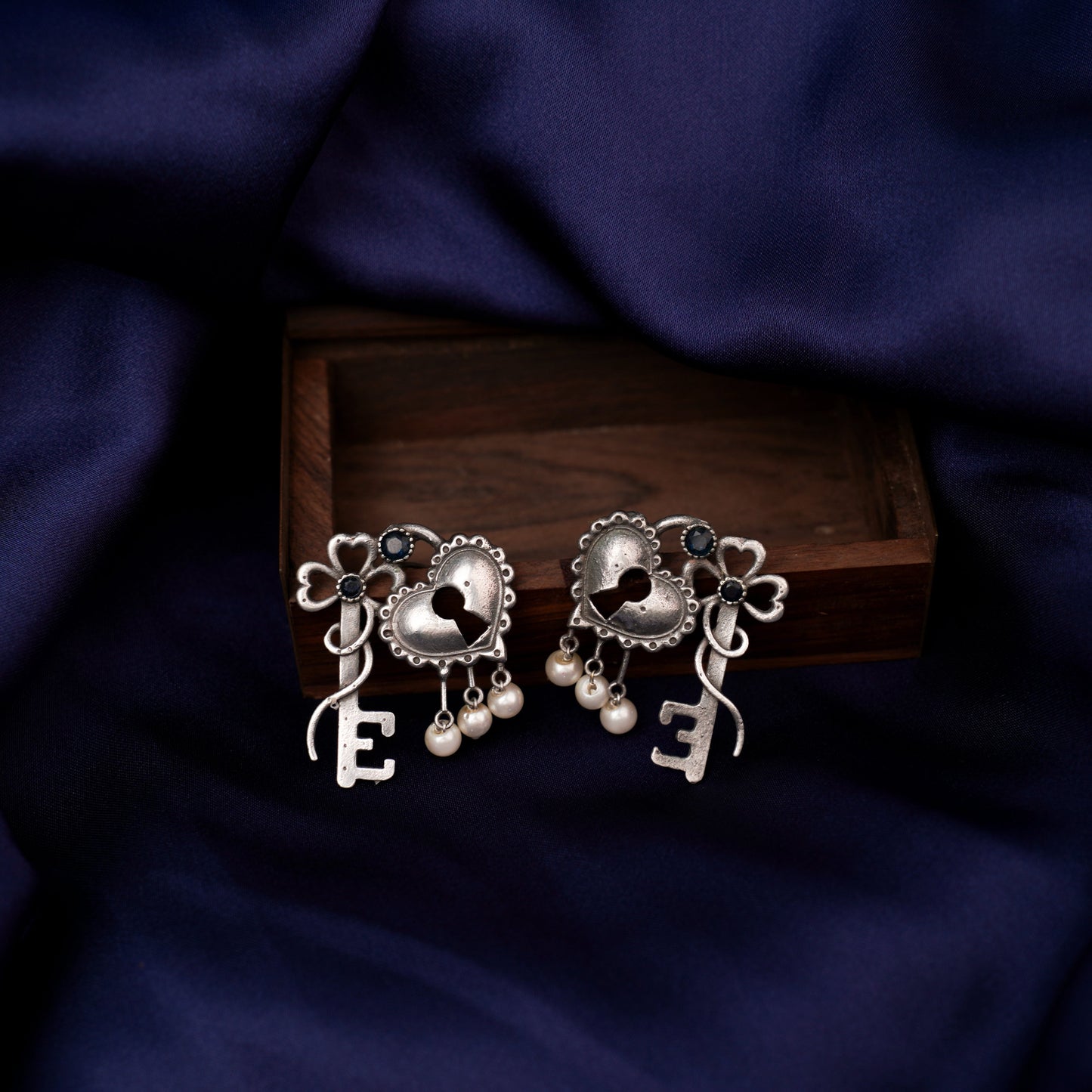 Kunjika- Silver Brass Oxidised dangler earrings (Blue)