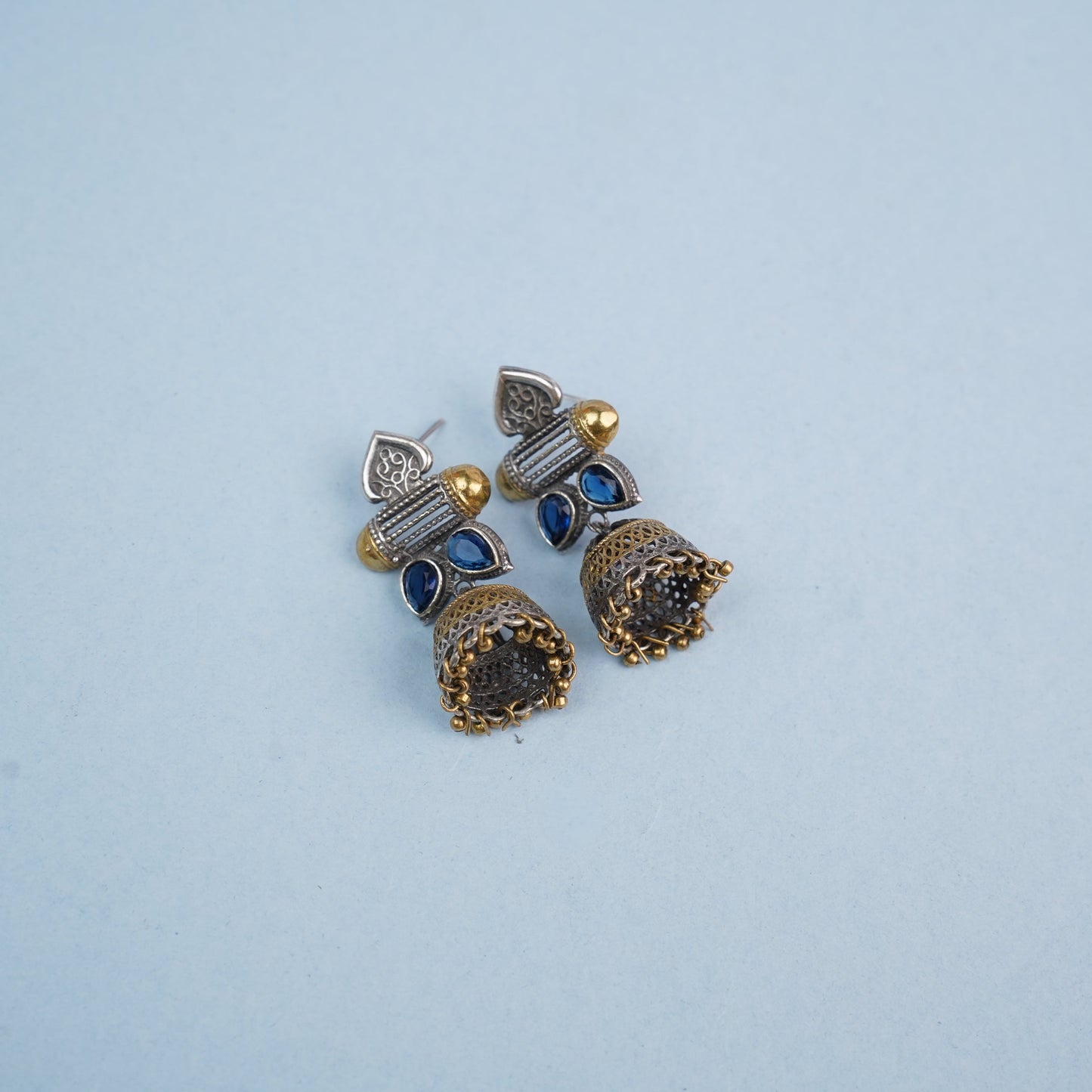 Rupali – Oxidised Silver Brass Stone-Studded Jhumka Earrings(Blue)