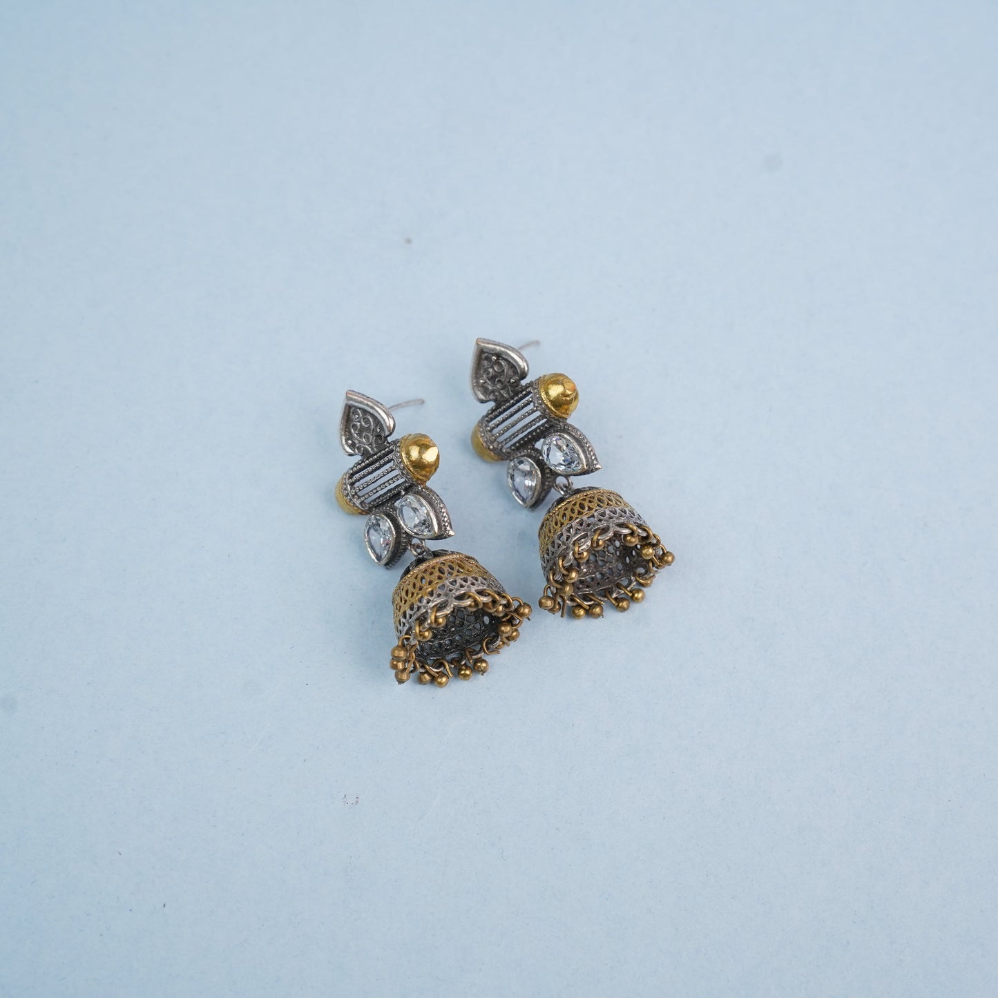 Rupali- Silver Brass Stone studdes Oxidised Jhumka Earrings(White)